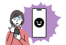 女性がフィッシング詐欺に遭ってしまい青ざめた様子。